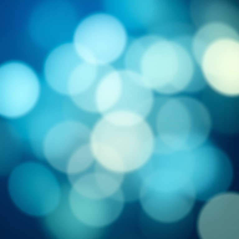 Create an abstract image of soft, blurred circles in varying shades of blue and green on a darker blue background, using a DSLR camera with a 50mm lens, f/1.8 aperture, ISO 200, and soft focus settings for enhanced bokeh effect.
