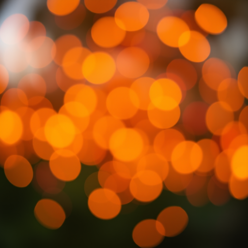 Create an abstract background of multicolored bokeh circles in warm tones of orange, yellow, and red, shot with a Canon EOS R5, 50mm lens at f/1.8, ISO 100, and a shallow depth of field for enhanced focus and clarity.