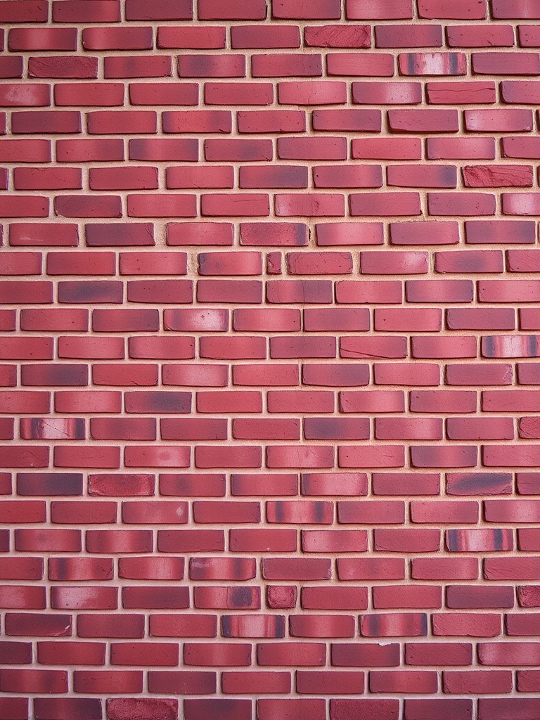 Generate a high-resolution image of a red brick wall, captured with a DSLR camera at f/8 aperture, 1/125 shutter speed, ISO 100, in a straight-on view with a slight vignette effect.