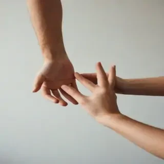 hands reaching