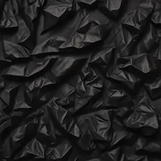 crumpled black paper