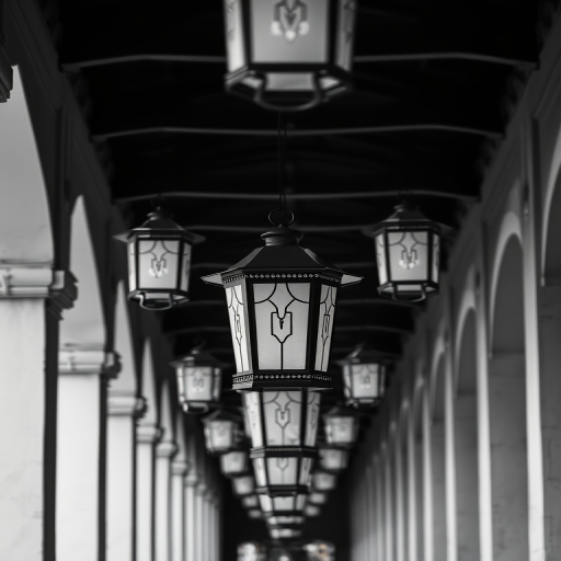 create a high-resolution black and white photograph of hanging lanterns aligned in a colonnade, using a Canon EOS R6, 50mm f/1.8 lens, aperture set to f/2.8, shutter speed 1/60s, ISO 200, capturing a symmetrical perspective from a low angle to enhance depth and focus on the lantern details.