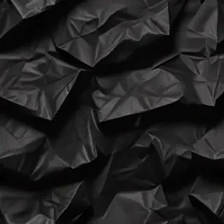 black crumpled paper