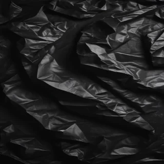 black crumpled paper