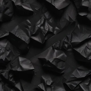 crumpled black paper