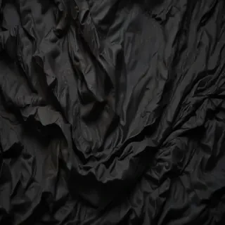 crinkled black paper