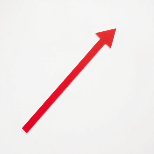 Create an image of a stylized red arrow pointing upwards and to the right, set against a clean white background, using a Canon EOS 5D Mark IV with an aperture of f/8, ISO 100, and a focal length of 50mm in a top-down view with a flat lay style.