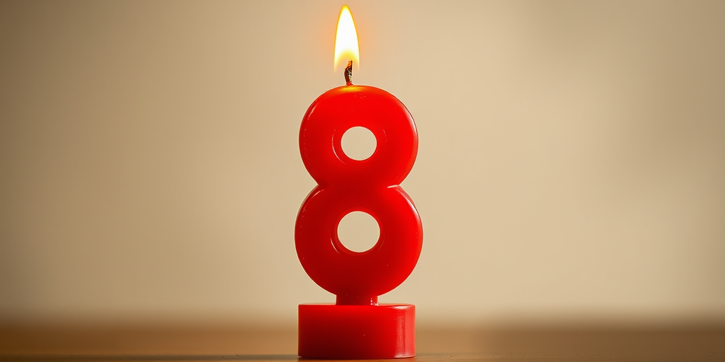 Create a high-resolution image of a red number 8 candle with a bright flame on top, using a DSLR camera with a f/2.8 aperture, 50mm lens, 1/125 shutter speed, and a soft-focus background for enhanced depth and clarity.