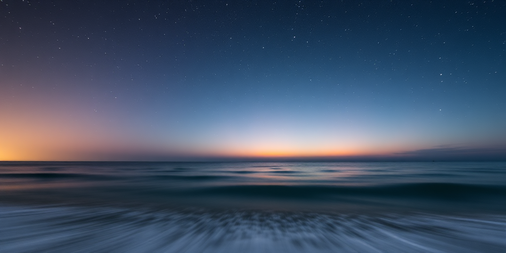 Wide-angle shot of a serene ocean at twilight with a starry sky, f/8 aperture, ISO 200, 30-second exposure, tripod-mounted DSLR, long exposure photography style.