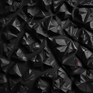 crumpled black paper