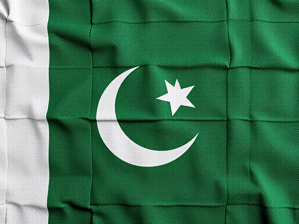 Generate a high-resolution image of the Pakistani flag with realistic textures, captured using a DSLR camera at f/8 aperture, ISO 100, 1/100s shutter speed, from a frontal view, emphasizing vibrant colors and intricate details in the fabric.