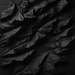 crinkled black paper