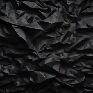 black crumpled paper