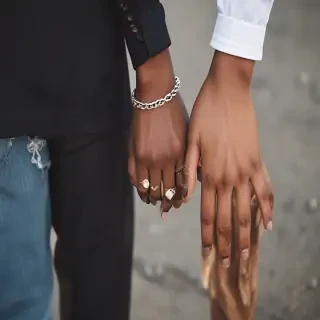 black couple holding hands