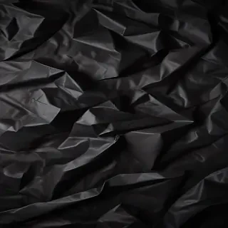 black crumpled paper