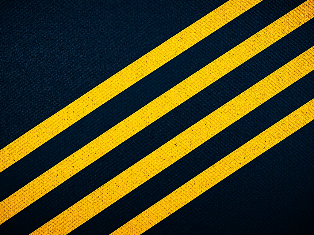 Generate an image of a textured surface with bold black and yellow diagonal stripes, captured at a low angle using a DSLR camera with a 35mm lens, aperture set to f/4 for depth, ISO 100 for clarity, and a soft natural lighting to enhance detail.
