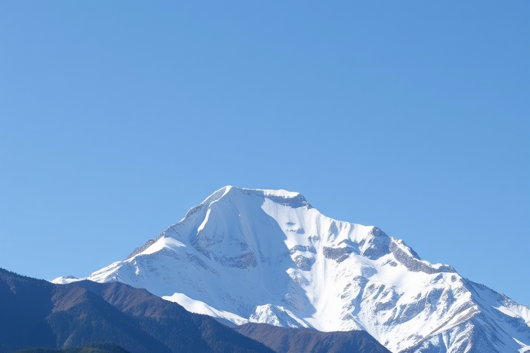 Generate a high-resolution image of a snow-capped mountain peak against a clear blue sky, captured with a DSLR camera at ISO 100, f/8 aperture, 1/250 sec shutter speed, using a wide-angle lens in landscape orientation.