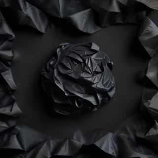 crumpled black paper