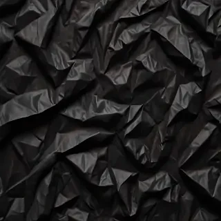 black crumpled paper