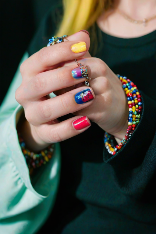 detailed edges, detailed image, perfection style, A cinematic detailed image of a woman with colorful nails holding a cup in front of camera, movie themed, sharp, detailed background, epic cinematic photography, artistic style, dramatic light style, cinematic color style, Kodak 35mm film style, detailed style, hand focus style, 1girl, solo, holding, jewelry, nail polish, blurry, bracelet, fingernails, depth of field, blurry background, red nails, close-up, blue nails, green nails, yellow nails, multicolored nails, nail art, pink nails, realistic, long sleeves, black shirt, beads, bead bracelet, photorealistic, hand focus