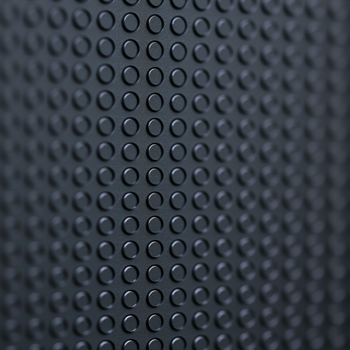 Generate a high-resolution image of a black perforated metal texture with evenly distributed circular holes, captured with a Canon EOS 5D Mark IV at f/8, ISO 100, 1/125s, in macro view using a shallow depth of field.