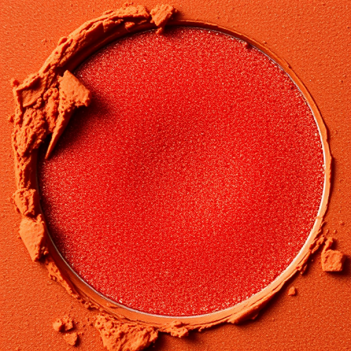 Spicy Cinnamon Spark features a warm terracotta base with subtle red shimmer, adding a touch of heat and allure to autumn-inspired makeup looks.