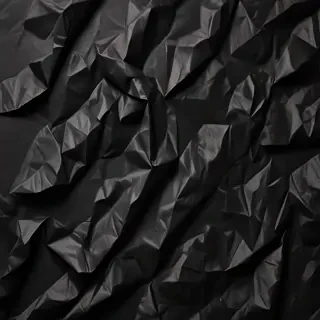 black crumpled paper
