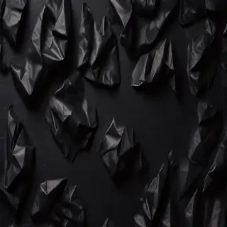 crumpled black paper