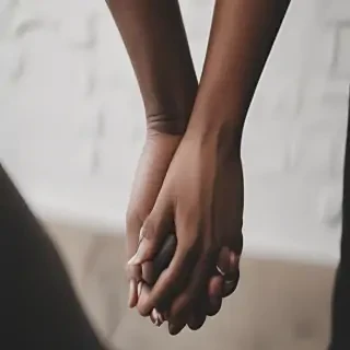 black couple holding hands