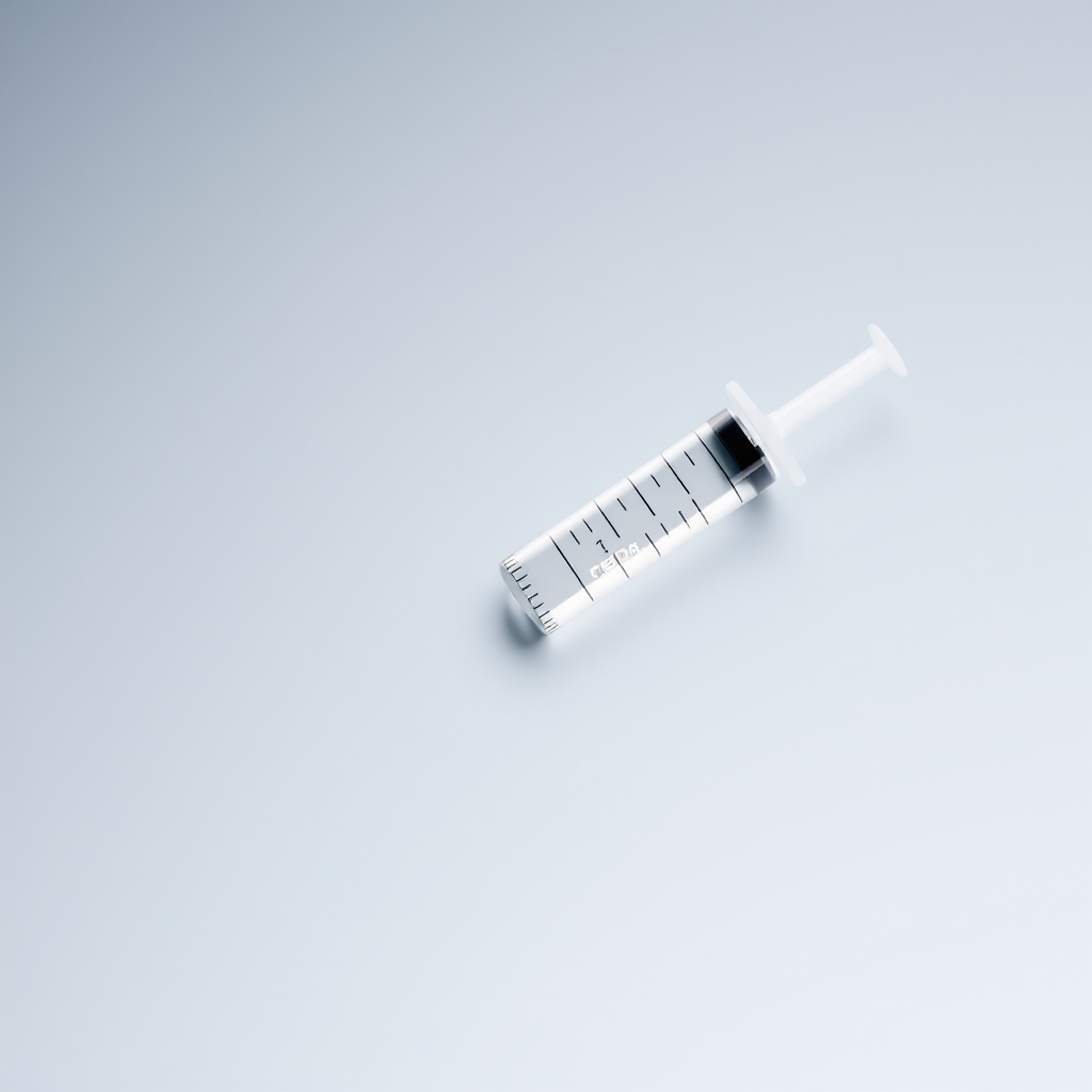 syringe with a clear background close-up shot, aperture f/2.8, shutter speed 1/60s, ISO 100, macro lens, studio lighting, high-resolution digital camera