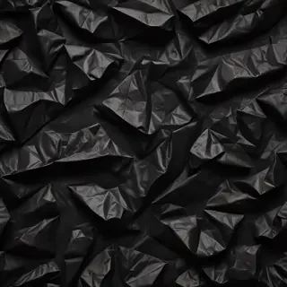 black crumpled paper