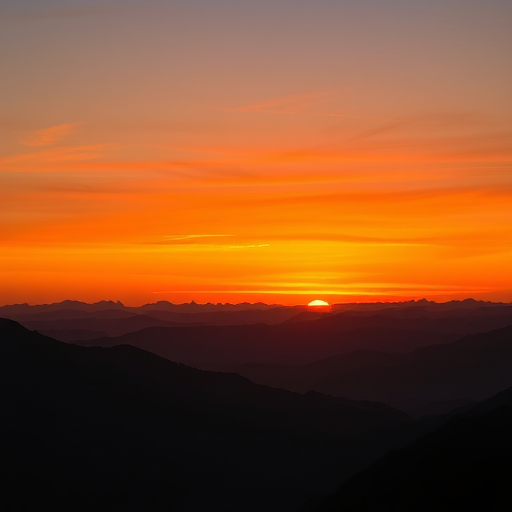Create a vibrant sunset landscape with layered mountains and a clear sky, using a DSLR camera, 50mm lens, aperture f/8, ISO 100, and a low angle view to enhance depth and color saturation.