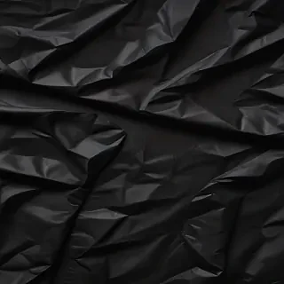 crumpled black paper