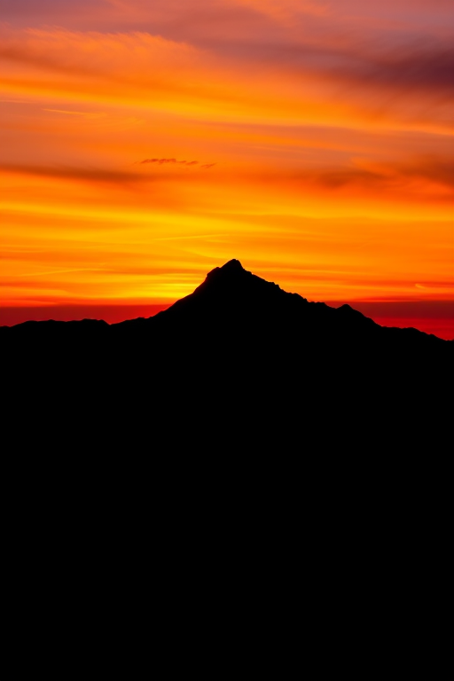 Generate a high-resolution image of a stylized black silhouette of a mountain landscape at sunset, with vibrant orange and purple hues in the sky, taken with a Canon EOS R5 camera, at ISO 100, f/11 aperture, 24mm focal length, in landscape orientation, with a wide-angle lens to capture the full expanse of the scene.