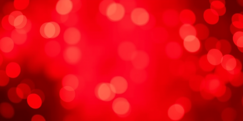 Generate a soft focus background with a rich red color and scattered light bokeh effects. Include varying sizes of circular shapes in a gradient of reds and subtle hints of gold to create a warm and festive atmosphere.