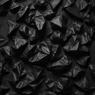 crumpled black paper