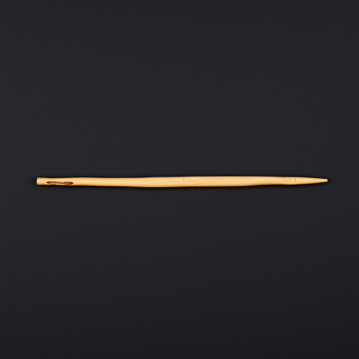 a simple brown wooden stick lying horizontally on a black background