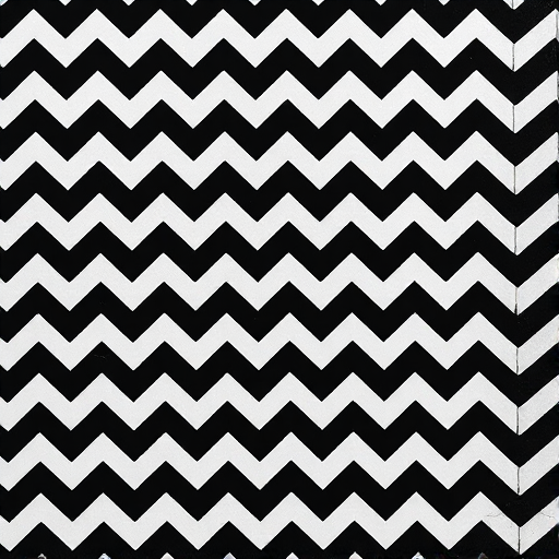 Create a high-resolution image of a repeating zigzag pattern in black and white, using a DSLR camera with a 50mm lens, f/8 aperture, ISO 200, shot from a top-down view for optimal symmetry and detail.