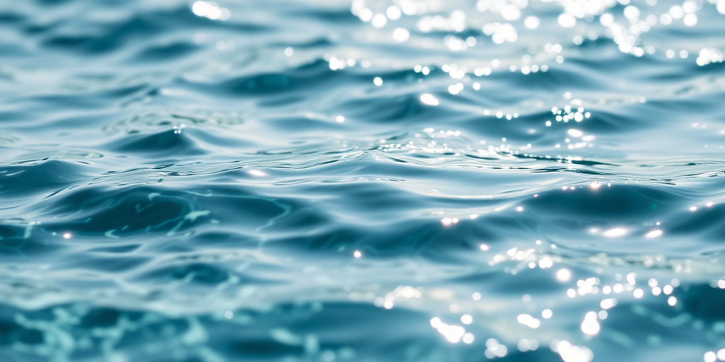 A close-up shot of shimmering water surface with ripples, taken with a DSLR camera, 50mm lens, f/2.8 aperture, ISO 100, 1/200s shutter speed, natural light, focus on texture and reflections to enhance detail and quality.