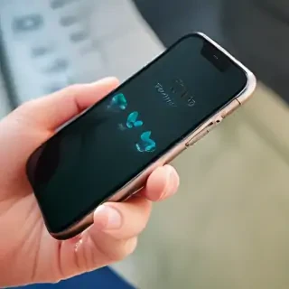 holding phone