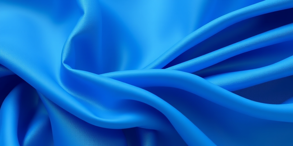 generate a high-resolution abstract image of flowing blue fabric with soft, smooth textures and gentle folds using a DSLR camera with a focal length of 50mm, aperture set to f/1.8, ISO 100, and a shallow depth of field to create a blurred background effect.