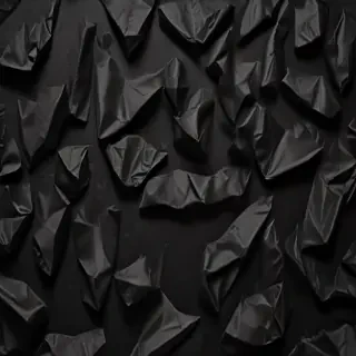 crumpled black paper