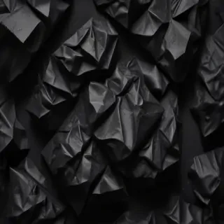 crumpled black paper