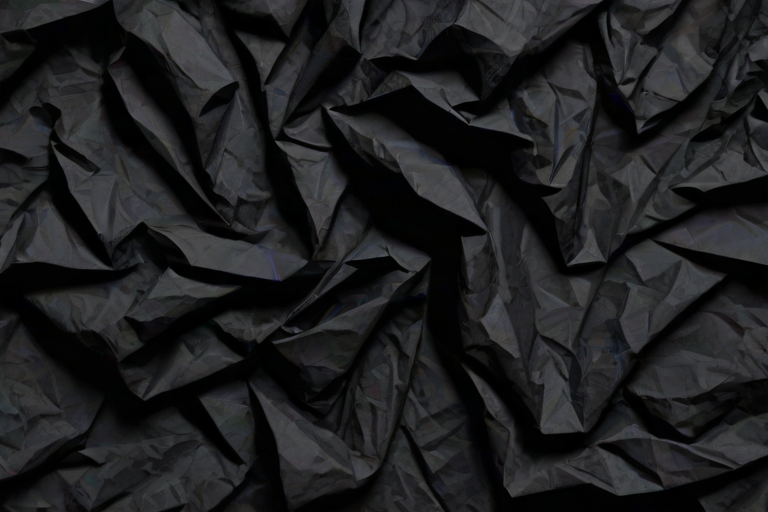 crinkled black paper