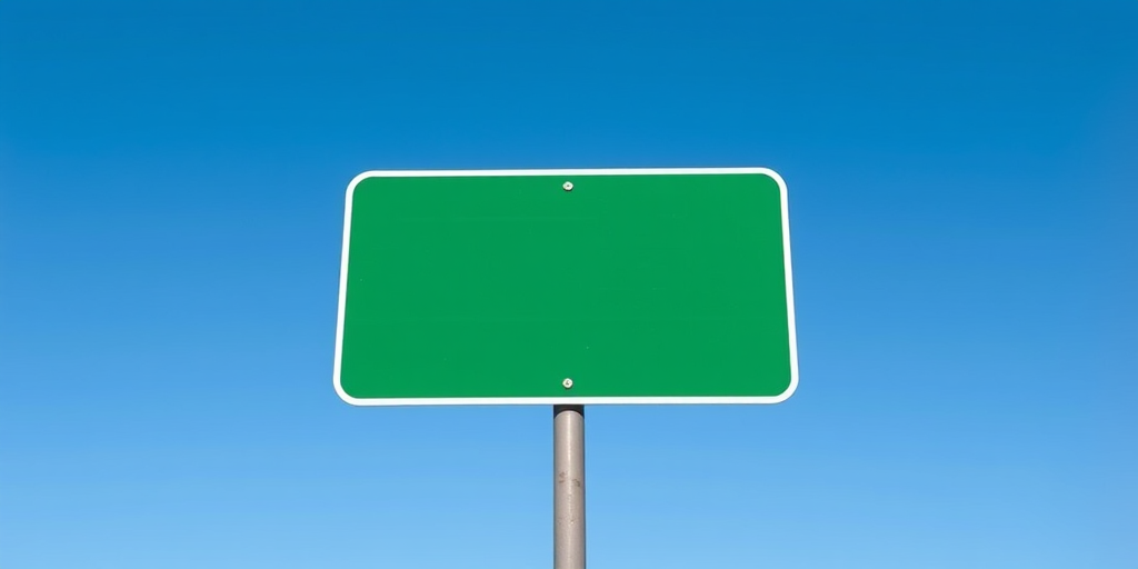 Create a high-resolution image of a blank green road sign on a silver pole against a clear blue sky, using a DSLR camera with a 50mm lens, aperture f/8, ISO 100, shutter speed 1/200s, capturing a straight-on view for maximum detail and clarity.