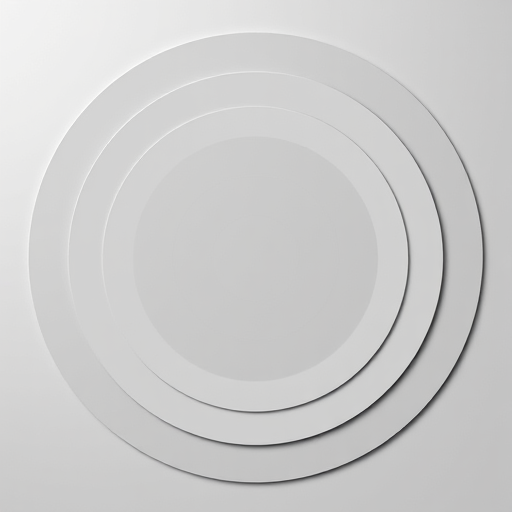 Create a high-resolution circular pattern design with concentric circles in varying shades of gray on a plain background, using a DSLR camera, 50mm lens, f/8 aperture, 1/125s shutter speed, ISO 200, top-down view for clarity.