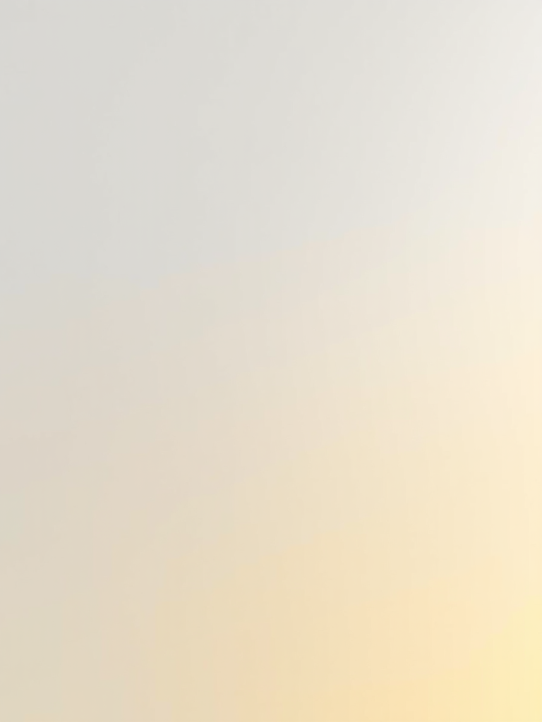Generate a smooth gradient background transitioning from light gray to soft yellow, using a Canon EOS R5 camera with a 50mm f/1.2 lens, aperture set at f/4, ISO 100, and a soft focus style for enhanced quality.