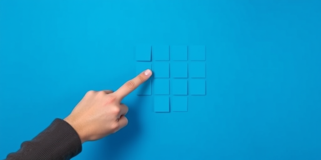 Create an image of a hand pointing at a cluster of blue square cards arranged on a gradient blue background, using a DSLR camera with a 50mm lens, aperture f/2.8, shutter speed 1/200s, ISO 100, top-down view, high dynamic range for enhanced clarity and detail.