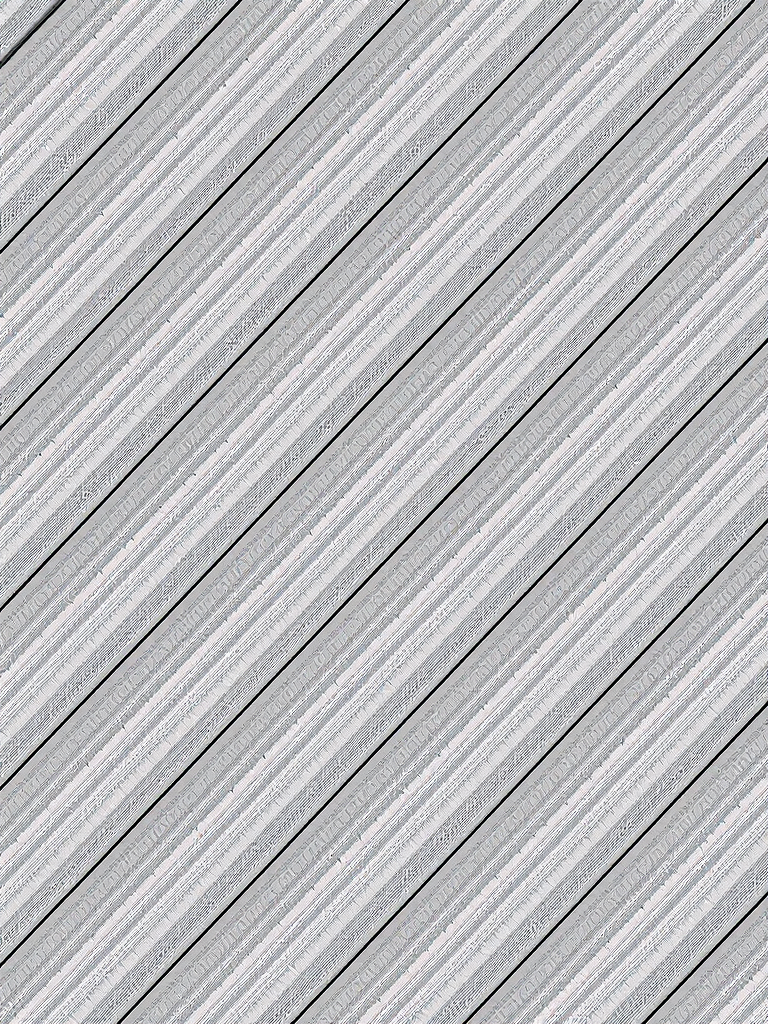 Create a high-resolution image of a diagonal striped pattern with varying shades of gray, using a DSLR camera, 50mm lens, aperture f/2.8, ISO 100, shot from a slightly elevated angle, in natural light for an even tonal distribution.