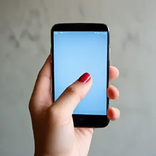 hand holding a phone